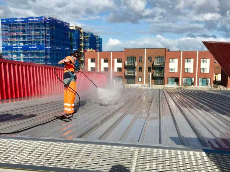 Waterblasting metal roof